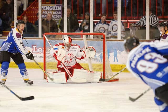 Phantoms' ace Ales Padelek shoots from distance against Swindon. Photo: Tom Scott - AMOimages.