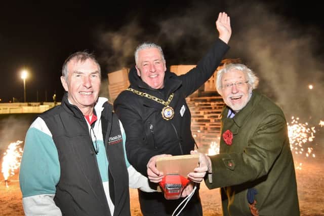 Firework Fiesta at the East of England Showground. Mayor David Sanders with  piro-technician Phil Branston and Philip Wright representing Rotary and Round Table EMN-160611-115228009