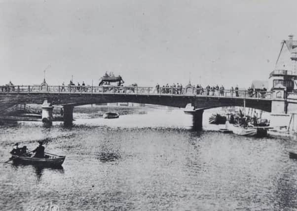 A horse drawn bus on Town Bridge in 1905