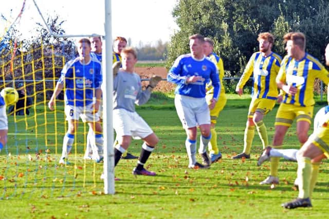 Moulton Harrox go 2-0 up against ICA Sports. Photo: Tim Wilson.
