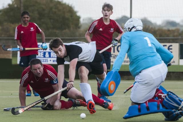 Action from Harleston seconds v City of Peterborough thirds. City are in red.