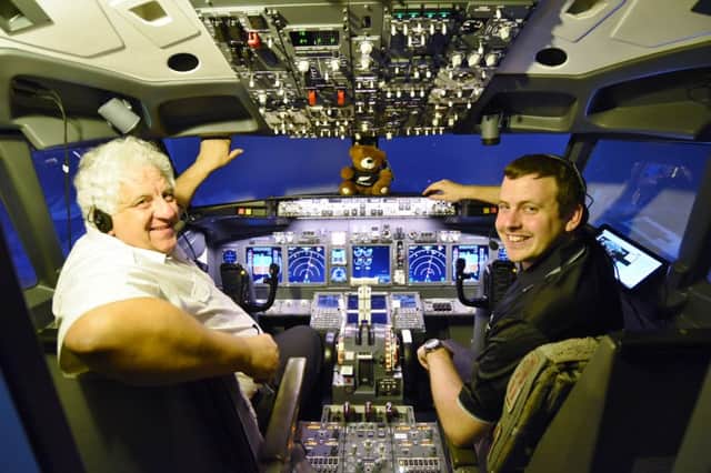 Sponsored seven day flight in simulator at Sibson Airfield. Pictured are pilots  Ed Donald and Jonathan Paris.......flying AT NIGHT OVER NEW ZEALAND.......hence dark windows. EMN-160611-122544009