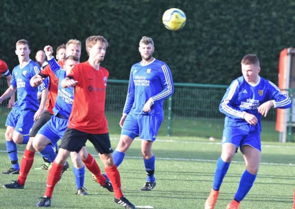 Action from AFC Stanground Sports 2, Pinchbeck United 3. Photo: David Lowndes.