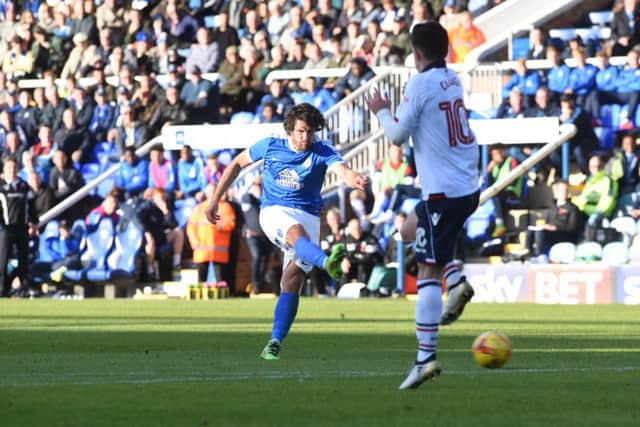 Michael Bostwick shoots wide during his 200th Posh appearance in the game against Bolton. Photo: David Lowndes.