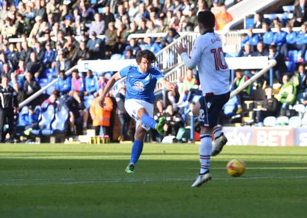Michael Bostwick shoots wide during his 200th Posh appearance in the game against Bolton. Photo: David Lowndes.
