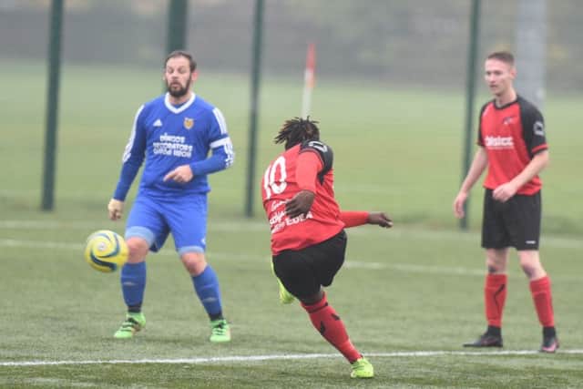 Netherton's hat-trick hero Rob Da Silva goes for goal against AFC Stanground Sports. Photo: David Lowndes.