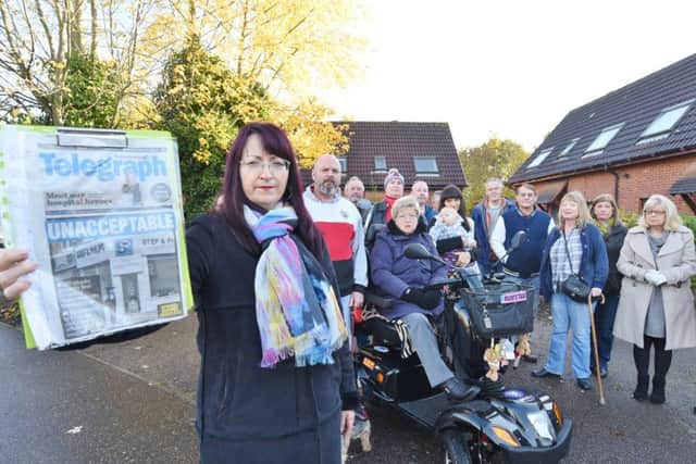 Residents of St Michael's Gate and neighbours gather for a protest against the evictions. Pictured (left) is Jelana Stevic with a petition and a copy of a PT front page EMN-161113-172443009