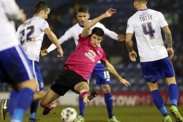 Jack Baldwin has formed a strong centre=back partnership with Ryan Tafazolli. Photo: Joe Dent/theposh.com.