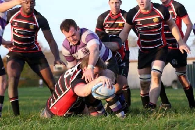 Robb Shingles scores a try for Oundle in their win over Stamford. Picture: Mick Sutterby