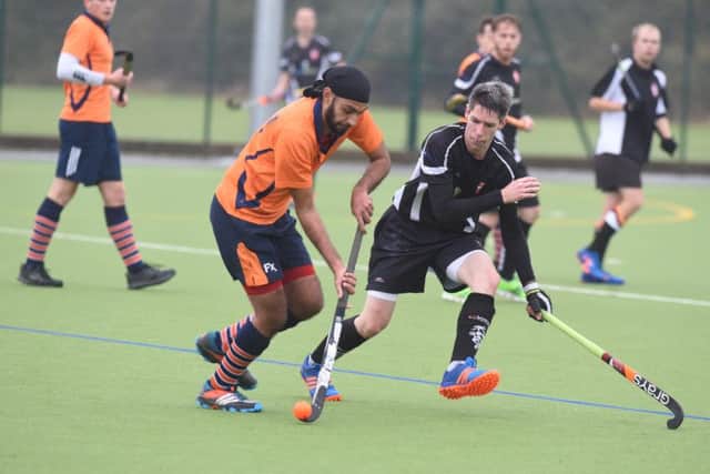 Action from Bourne Deeping (dark shirts) against East London. Photo: David Lowndes.