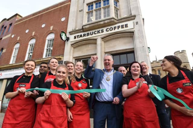 Mayor of Peterborough David Sanders with Starbucks staff