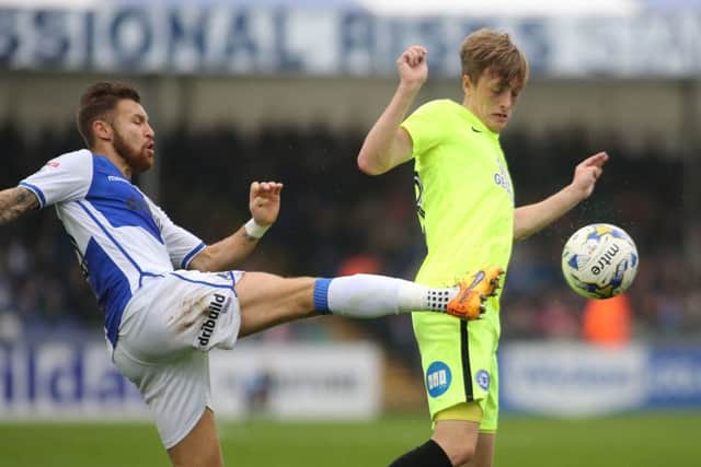Posh skipper Chris Forrester (right) is one caution away from a suspension. Photo: Joe Dent/theposh.com.