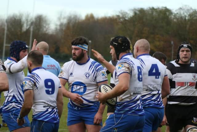 Sam Crooks is congratulated after scoring the first Lions try. Picture: Mick Sutterby