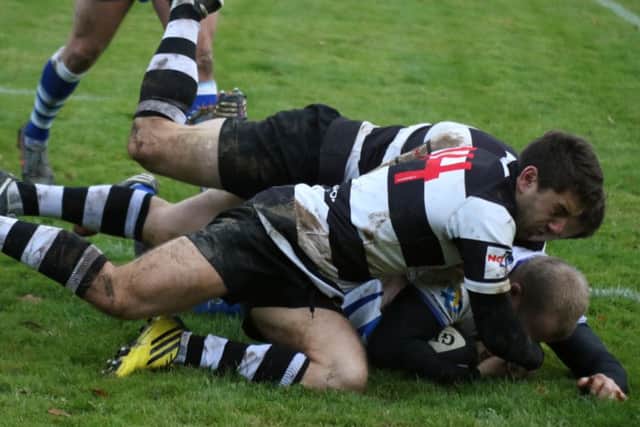 Arturius Balcunius scores a try for the Lions against Bedford Athletic. Picture: Mick  Sutterby