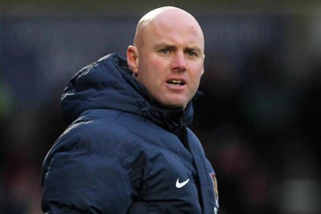 Cobblers boss Rob Page during the derby with Posh. Photo: Sharon Lucey.