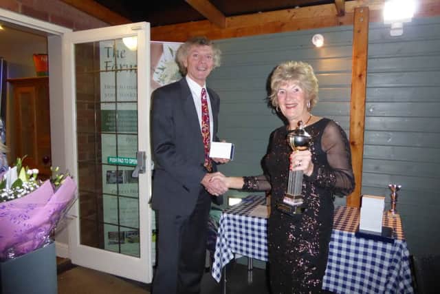 Georgina Jennings receives her award from Steve Hope.