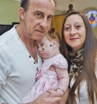 Sarah and Barrie Costigan of Yaxley with their terminally ill baby  Amelia-Rose (18 months-old) EMN-161122-230844009