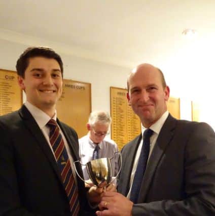 Alex Laud of Nassington receives the Division One trophy.