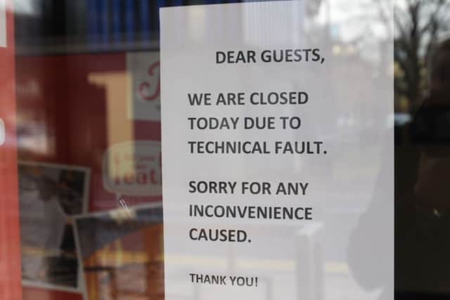 The sign on the front door of Jimmy's Restaurants