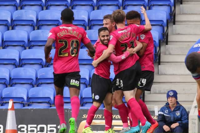 Posh celebrate a goal in their 5-1 win at Oldham last season. Photo: Joe Dent/theposh.com.