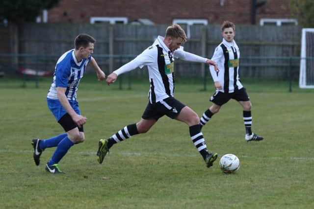 Jake Sansby strides out for Peterborough Northern Star against Harrowby. Photo: Tim Gates.