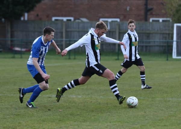 Jake Sansby strides out for Peterborough Northern Star against Harrowby. Photo: Tim Gates.