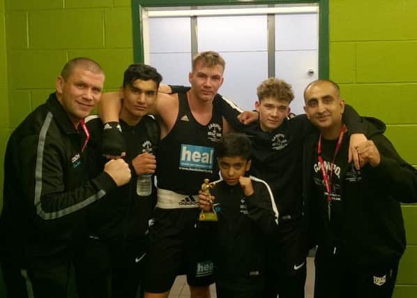 Pictured is the Peterborough Police Amateur Boxing Club team at Nottingham. From the left they are Chris Baker,  Imran Aref, Artur Tomasevic, Kacper Kozak, Akif Shirazi and (at the front) Imraan Shirazi.