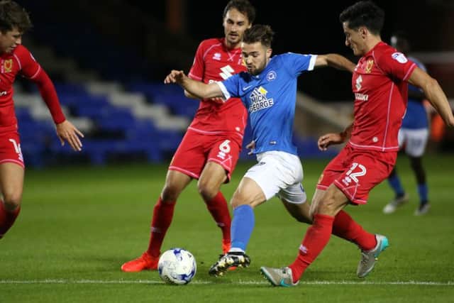 Midfielder Gwion Edwards could be back in the Posh starting line-up at Notts County.
