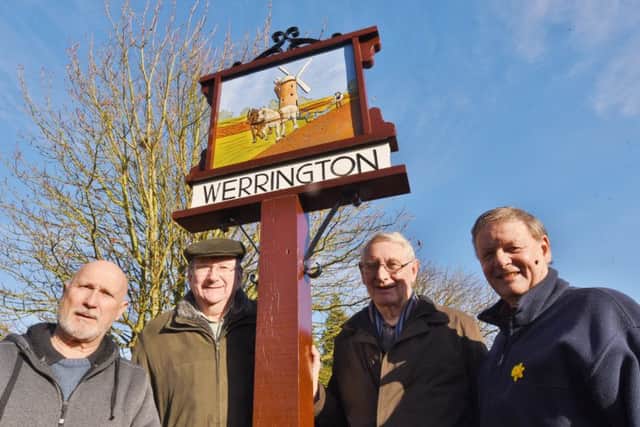 New Werrington Village sign installed on the village green. Pictured Ron McKenna, Vince Moon, Rod Boulton and Geoff Smith EMN-161126-164711009