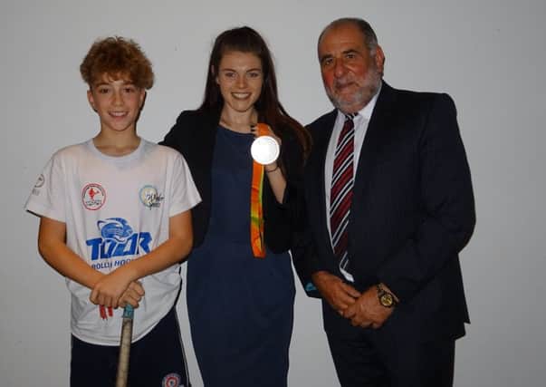 SportsAid chairman Phil Elmer with Jake Reed and Lauren Steadman.
