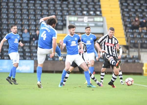 The 'immense' Michael Bostwick scuffed this early chance wide from a Posh a corner at Notts County. Photo: David Lowndes.