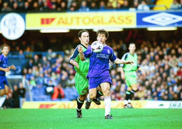 Action from Chelsea 5, Posh 0 in a 2001 FA Cup tie. Gianfranco Zola and Richard Forsyth are the players involved.