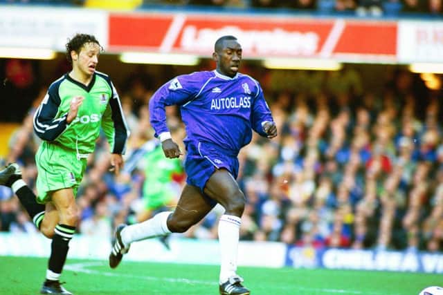Chelsea's Jimmy Floyd Hasselbaink and Gareth Jelleyman of Posh during the 2001 FA Cup tie between Chelsea and Posh.