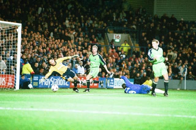 Jimmy Floyd Hasselbaink scores Chelsea's fifth goal in a 2001 FA Cup tie against Posh at Stamford Bridge.