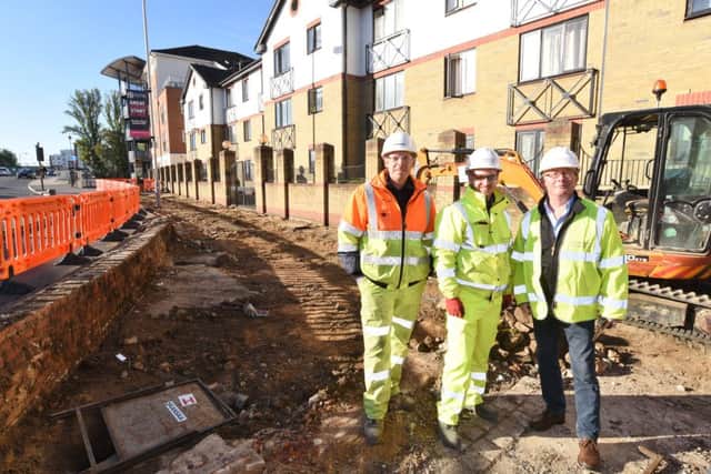 Scott Blackburn and David Edevane from Peterborough Highways with Coun Peter Hiller at Lower Bridge street at the start of streetworks EMN-160923-171434009