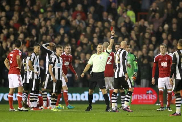 Jonjo Shelvey of Newcastle is sent off after a clash with Nottingham Forest midfielder Henri Lansbury.