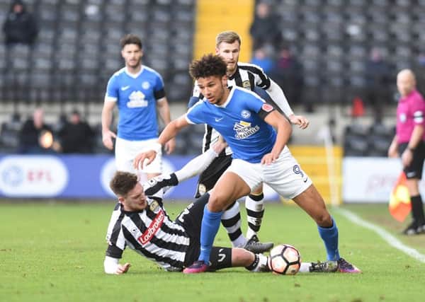 Posh striker Lee angol in action at Notts County. Photo: David Lowndes.
