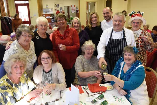 From the Blue Bell pub at Glinton Nick, Will, Bridget and Kelly Frankgate cooking and serving christmas lunch for the Glinton Friendship Club at the village hall. EMN-160512-150100009