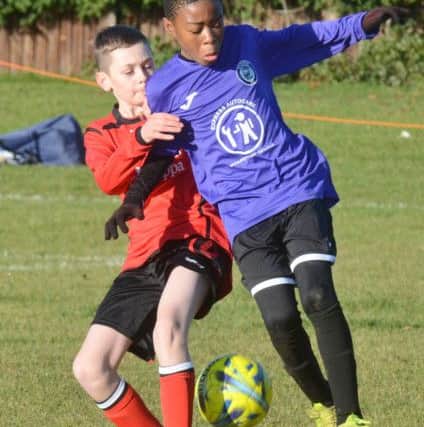 Action from the Under 12 game between Netherton and Riverside.