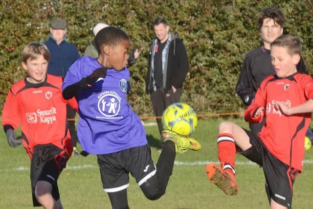 Action from the Under 12 game between Netherton and  Riverside.