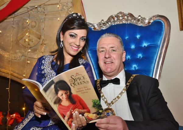 Mayor David Sanders with Spice Queen Parveen Ashraf at the launch of her new receipe book EMN-160512-150244009