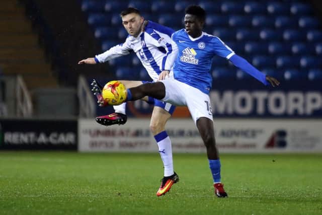 Leo Da Silva Lopes of Posh battles for possession with nJay O'Shea of Chesterfield. Photo: Joe Dent/theposh.com.