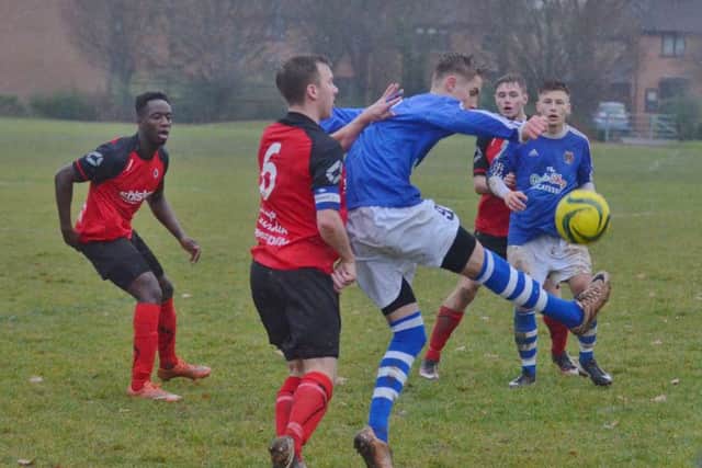 Action from the Peterborough Premier Division draw between ICA Sports and Netherton United. Photo: David Lowndes.
