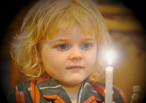 The Peterborough School christingle service at St John's church, Cathedral Square. Pictured is  Elsie Milligan Smith (4). nat16 EMN-161212-160327009