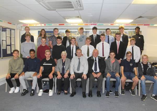 Peterborough Referees Association chairman Robert Windle (front, centre) with some of his young referees.