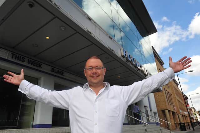 Steve Potts outside the Broadway Theatre