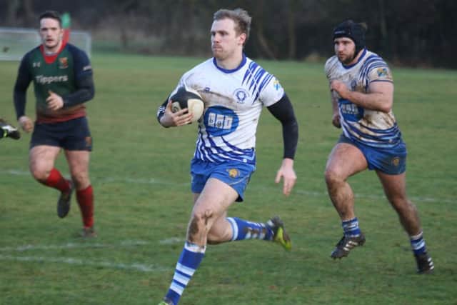 Adrian  Enwright on the run for the Lions against Lichfield. Picture: Mick Sutterby
