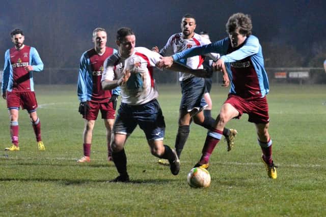 Action from Deeping Rangers (maroon) win over Leicester Nirvana in the United Counties Premier Division. Photo: Tim Wilson.