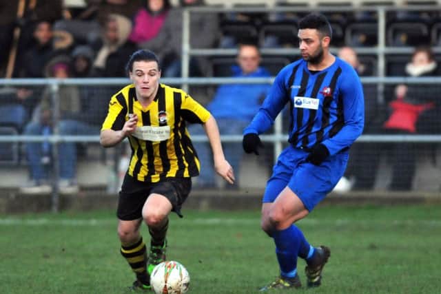 Action from Holbeach 3, Leicester Nirvana 0. holbeach are in yellow. Photo: Tim Wilson.