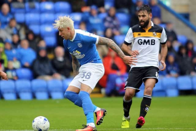 George Moncur in action for Posh against Port Vale.